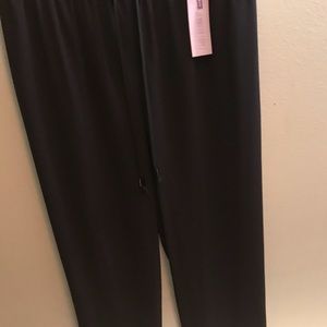 Luxurious slacks. Polyester but feels like silk.